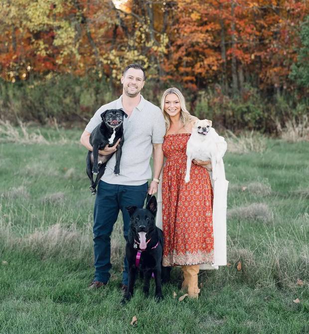 Kevin Dull with his family and their dogs Charlie, Oscar and Gwen in Central Ohio
